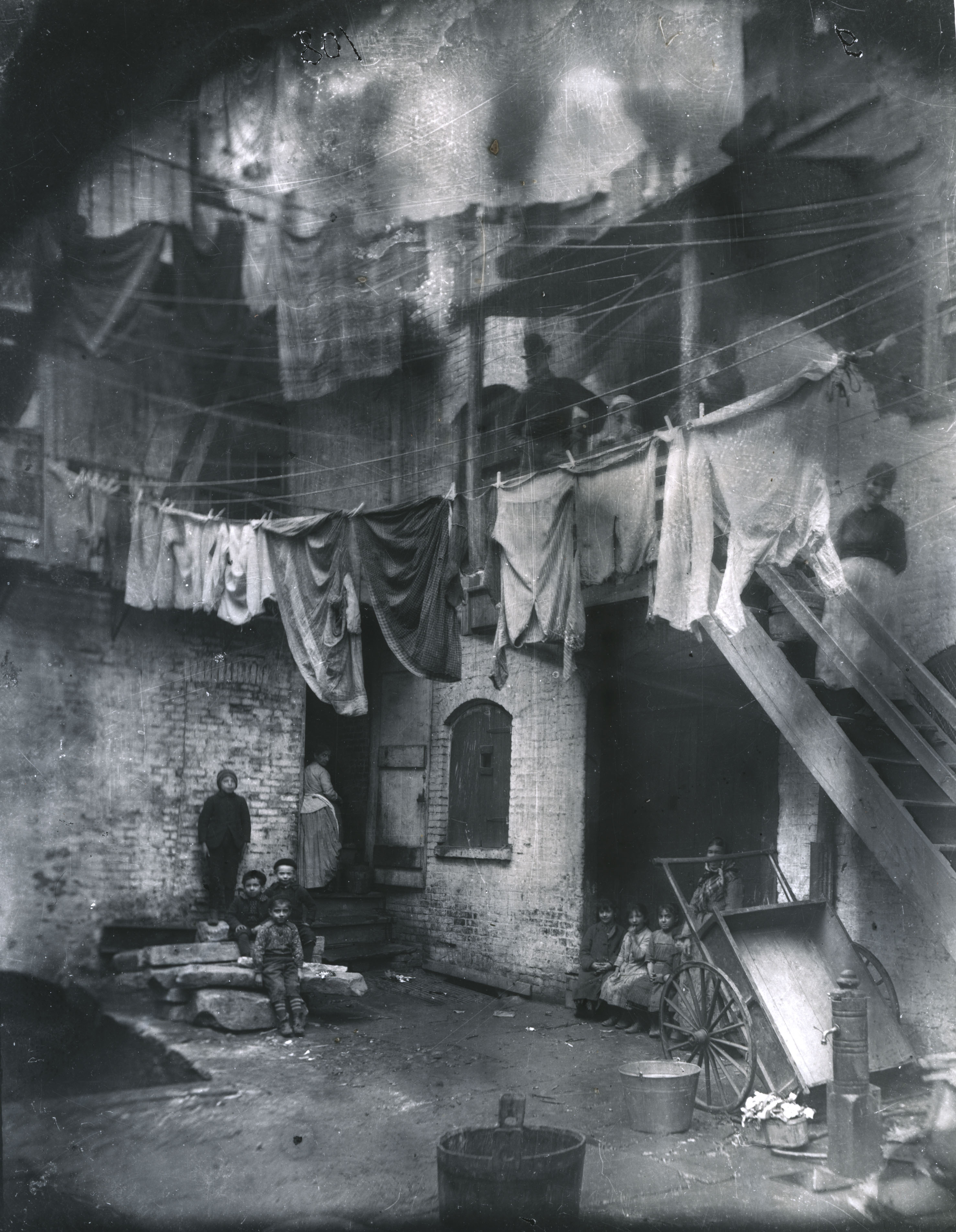 Tenement Yard, How the Other Half Lives. Via Preus Museum