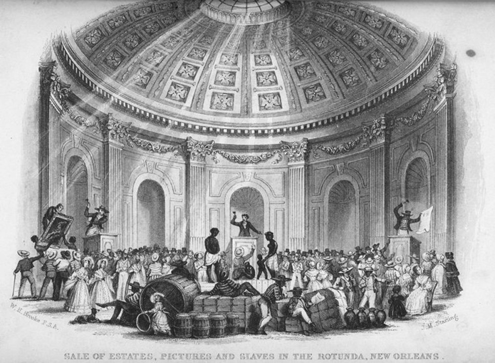 A slave market in a building with an enormous dome.