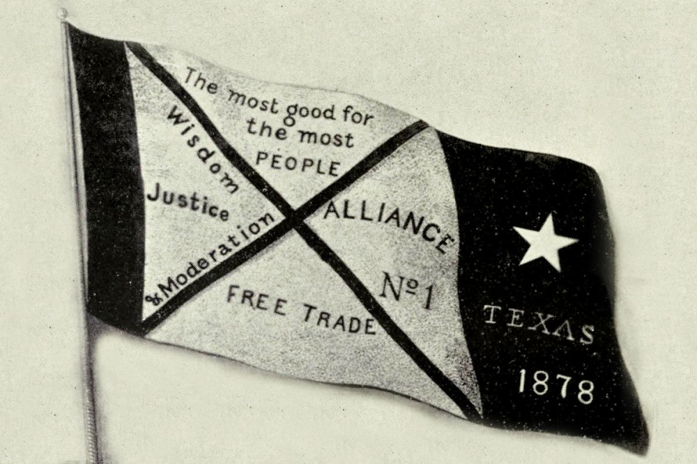 An illustration of the banner of the first Texas Farmers' Alliance.It reads, "Texas 1878," "The most good for the most people," "Wisdom, Justice, and Moderation," "Alliance No. 1," and "Free Trade."