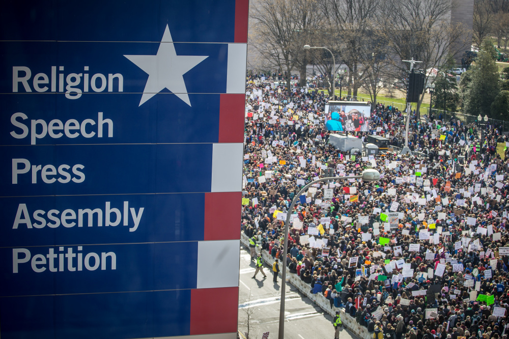 Just weeks after seventeen students were murdered at Stoneman Douglas High School in Parkland, Florida, more than two million Americans across the country participated in the March for Our Lives demonstration to advocate for more effective gun control laws. Several Stoneman Douglas students emerged as prominent national activists in the wake of the shooting. This photo of the demonstration, taken from the Newseum in Washington D.C., captures a graphic on the exterior of the museum listing five protections of the First Amendment. Phil Roeder via Flickr 