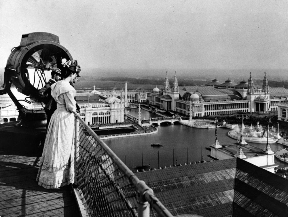 A photograph of visitors to the Columbian Exposition of 1893 enjoying the view of the Court of Honor from the roof of the Manufacturers Building. C.D. Arnold photo, Art Institute of Chicago, via Wikimedia 