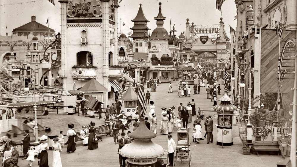 Amusement-hungry Americans flocked to new entertainments at the turn of the twentieth century. In this early-twentieth century photograph, visitors enjoy Luna Park, one of the original amusement parks on Brooklyn's famous Coney Island. Visitors to Coney Island's Luna Park, ca.1910-1915. Via Library of Congress (LC-B2- 2240-13).