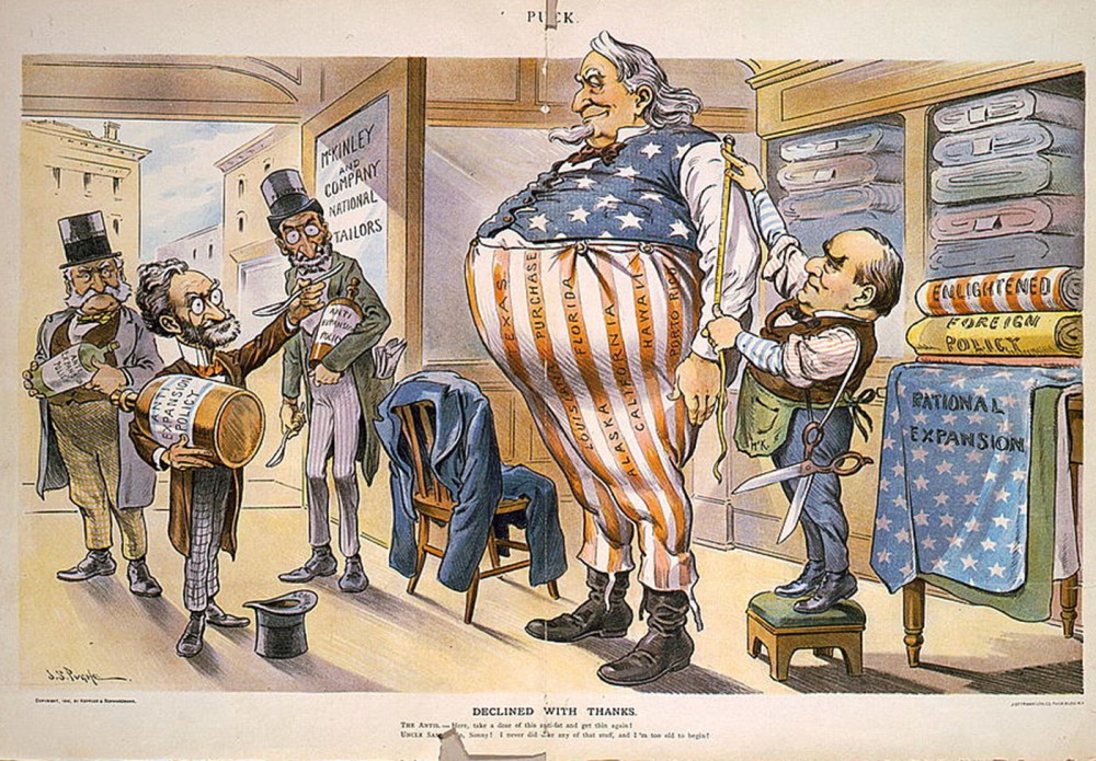Tailor President McKinley measures an obese Uncle Sam for larger clothing, while Anti-Expansionists like Joseph Pulitzer unsuccessfully offer Sam a weight-loss elixir. As the nation increased its imperialistic presence and mission, many like Pulitzer worried that America would grow too big for its own good. John S. Pughe, “Declined With Thanks,” in Puck (September 5, 1900). Wikimedia, http://commons.wikimedia.org/wiki/File:McKinleyNationalExpansionUncleSamPulitzer.jpg.