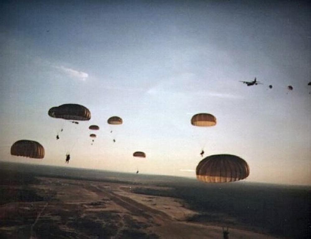 This photograph shows the deployment of U.S. Army Rangers into Grenada. Photograph, October 25, 1983. Wikimedia, http://commons.wikimedia.org/wiki/File:US_Army_Rangers_parachute_into_Grenada_during_Operation_Urgent_Fury.jpg. 