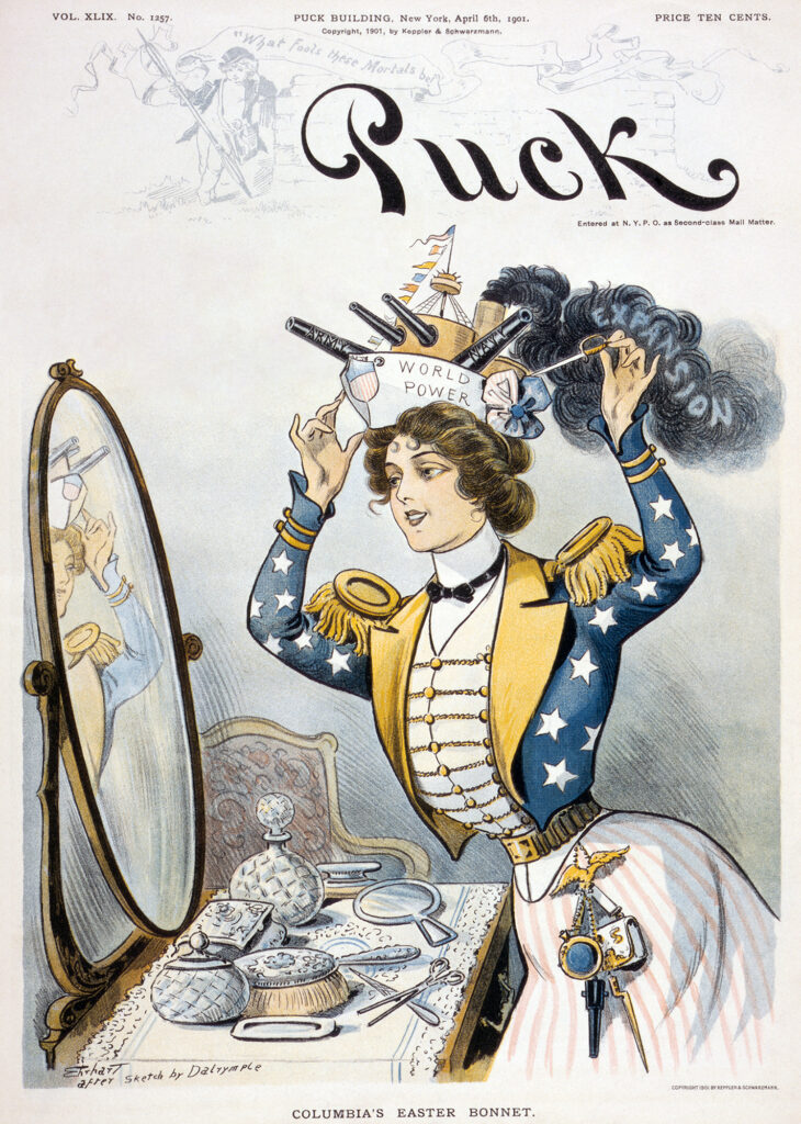 A woman looks in a mirror as she dons a hat in the form of a battleship labeled “World Power.” 