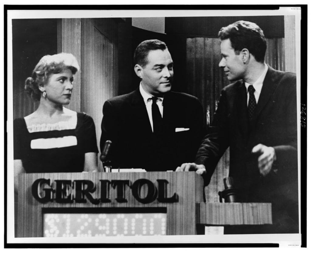 Scene of a man and woman competing on a game show.