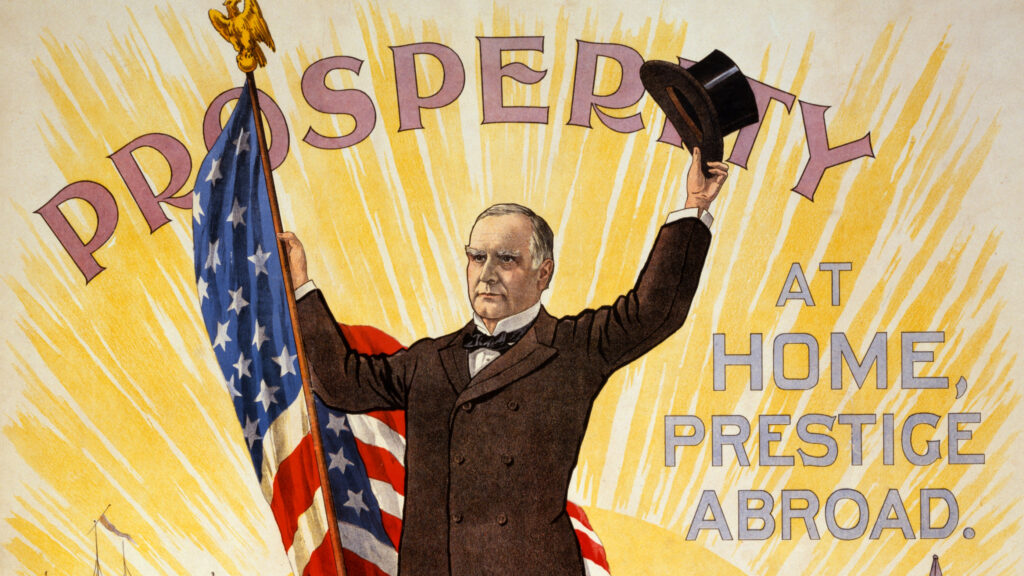 A bright poster with a man in a suit holding his top hat in the air in one hand and an American flag in the other, in front of a bright sunrise.