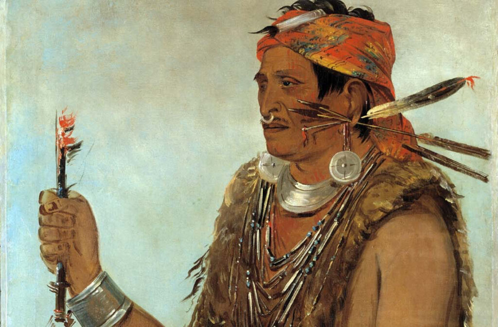 A portrait of Tenskwatawa in traditional Native American attire.