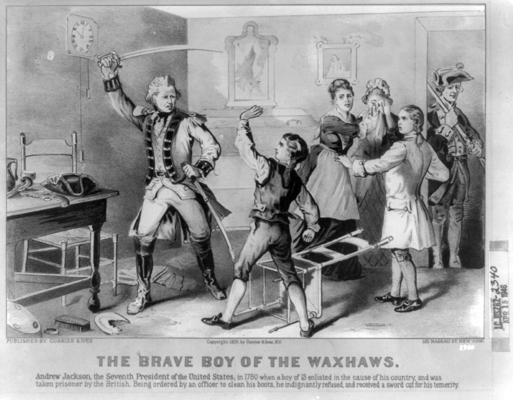 This artwork depicts Andrew Jackson as a young boy of 13 years old, protecting his family from a British soldier. The scene is presumably the interior of a room in the Jackson family home. A chair is overturned, a plate lays broken on the ground, and other household items litter the floor depicting a chaotic scene where a scuffle has taken place. Two women—presumably Jackson’s mother and sister—stand behind Jackson, looking upset and distraught. Jackson’s older brother stands near the two women. In the center of the artwork, the young Jackson raises his hands in defense against a British soldier who has his cutlass drawn and held up ready to strike a blow. In the doorway of the room stands another British soldier looking on at the scene with his musket at the ready. Across the bottom of the artwork the text reads, “The Brave Boy of the Waxhaws. Andrew Jackson, the Seventh President of the United States, in 1780 when a boy of 13 enlisted in the cause of his country and was taken prisoner by the British. Being ordered by an officer to clean his boots, he indignantly refused and received a sword cut for this temerity.”