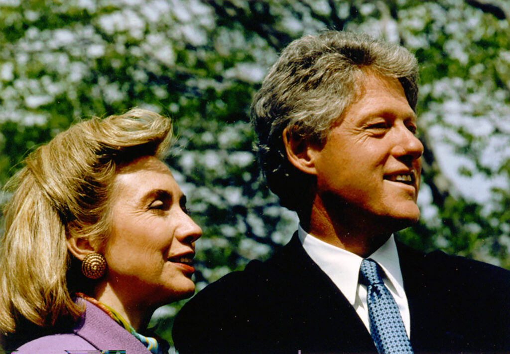 A close-in portrait of a man and a woman in profile.